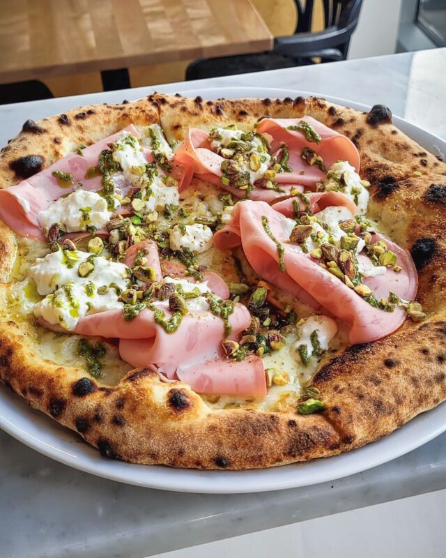 Plongez dans l’audace avec notre pizza Napolitaine à la Mortadelle, Pistaches, et Pesto! 🍕💥 Découvrez une explosion de saveurs qui réveillera vos papilles. 🔥 #RévolutionPizza #OsezLaDifférence

Elevate your pizza game with our badass Neapolitan Mortadella Pistachio Pesto pie! 🍕💥 Dive into a flavor explosion that’ll leave your taste buds begging for more. 🔥 #PizzaRevolution #daretobedifferent